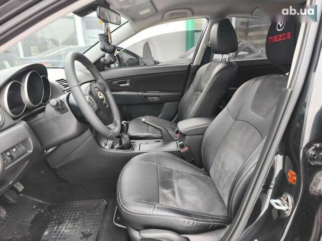 Мазда 3, объемом двигателя 2 л и пробегом 136 тыс. км за 6300 $, фото 10 на Automoto.ua