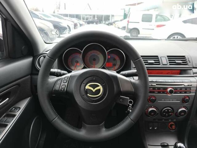 Мазда 3, объемом двигателя 2 л и пробегом 136 тыс. км за 6300 $, фото 16 на Automoto.ua