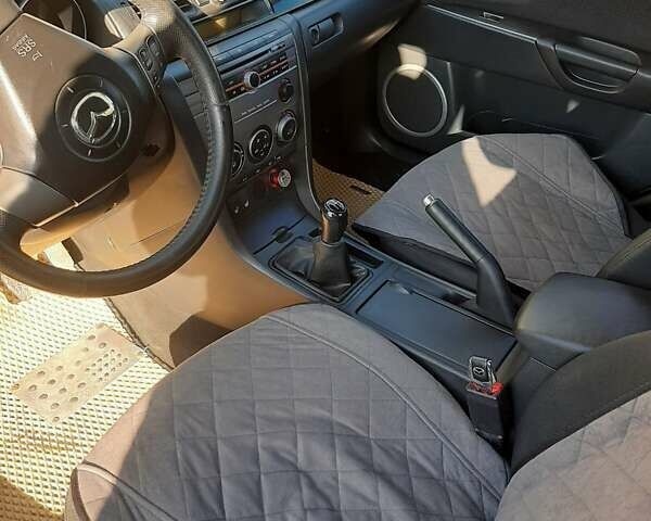 Мазда 3, объемом двигателя 1.6 л и пробегом 215 тыс. км за 5900 $, фото 6 на Automoto.ua