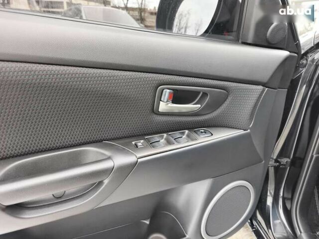 Мазда 3, объемом двигателя 2 л и пробегом 136 тыс. км за 6300 $, фото 11 на Automoto.ua