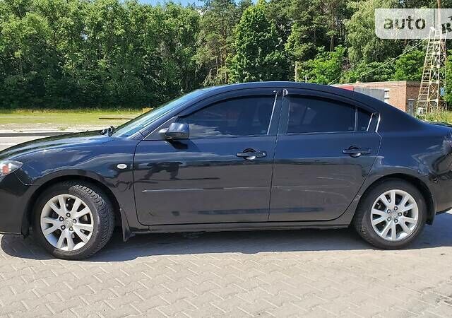 Мазда 3, объемом двигателя 1.6 л и пробегом 286 тыс. км за 6500 $, фото 12 на Automoto.ua