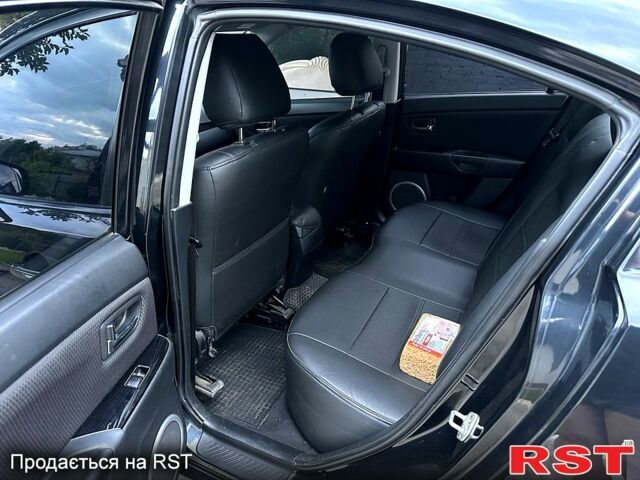 Мазда 3, объемом двигателя 1.6 л и пробегом 219 тыс. км за 6500 $, фото 4 на Automoto.ua