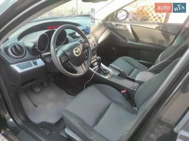 Мазда 3, объемом двигателя 2 л и пробегом 275 тыс. км за 6400 $, фото 9 на Automoto.ua