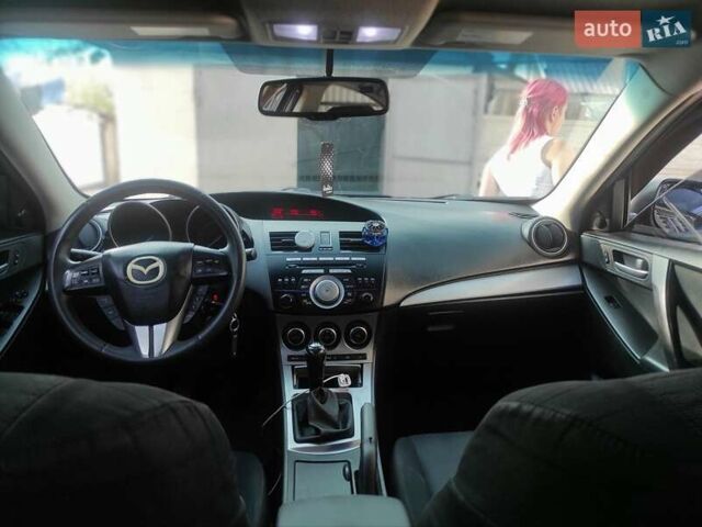 Мазда 3, объемом двигателя 2 л и пробегом 275 тыс. км за 6400 $, фото 12 на Automoto.ua
