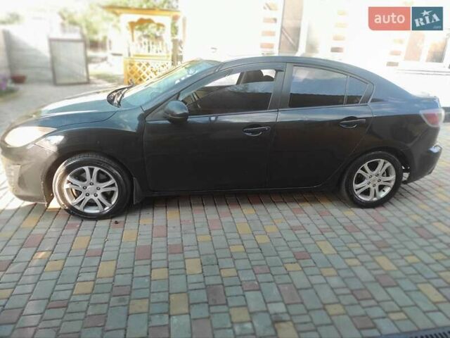 Мазда 3, объемом двигателя 2 л и пробегом 275 тыс. км за 6400 $, фото 1 на Automoto.ua