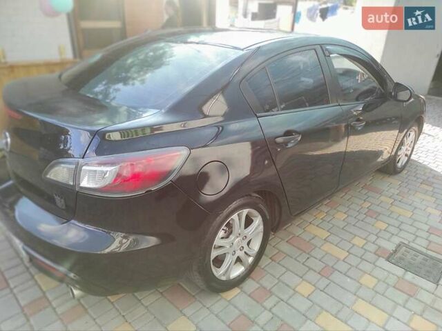 Мазда 3, объемом двигателя 2 л и пробегом 275 тыс. км за 6400 $, фото 7 на Automoto.ua