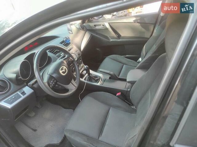 Мазда 3, объемом двигателя 2 л и пробегом 275 тыс. км за 6400 $, фото 10 на Automoto.ua