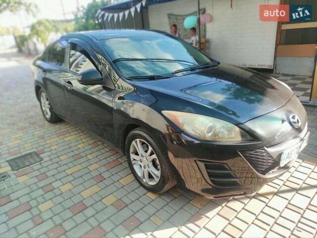 Мазда 3, объемом двигателя 2 л и пробегом 275 тыс. км за 6400 $, фото 5 на Automoto.ua