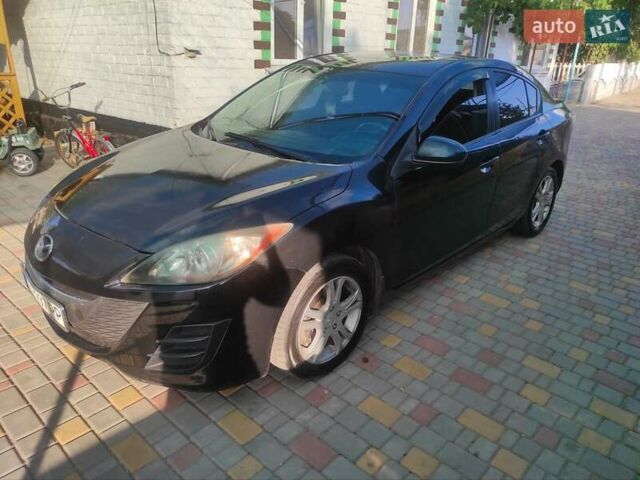 Мазда 3, объемом двигателя 2 л и пробегом 275 тыс. км за 6400 $, фото 14 на Automoto.ua