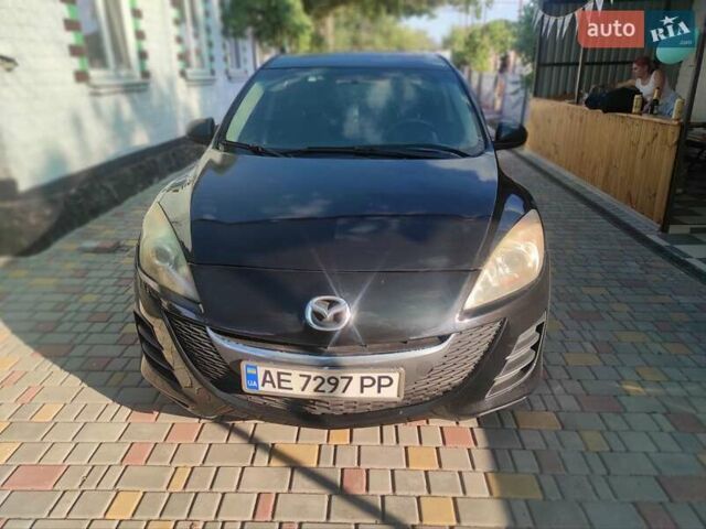 Мазда 3, объемом двигателя 2 л и пробегом 275 тыс. км за 6400 $, фото 3 на Automoto.ua