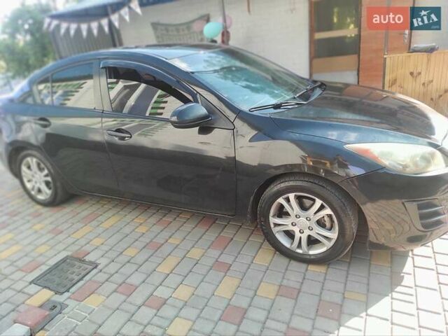 Мазда 3, объемом двигателя 2 л и пробегом 275 тыс. км за 6400 $, фото 6 на Automoto.ua