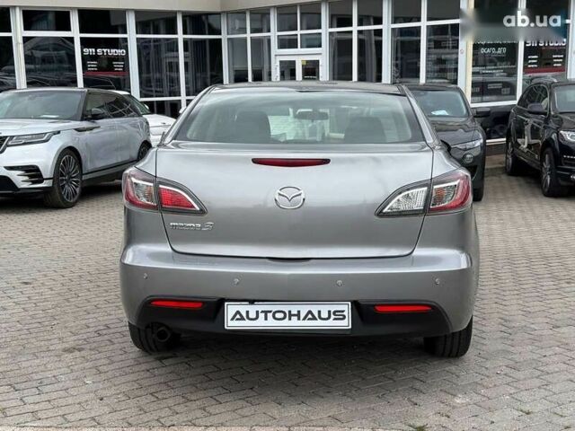 Мазда 3, объемом двигателя 1.6 л и пробегом 128 тыс. км за 8400 $, фото 4 на Automoto.ua