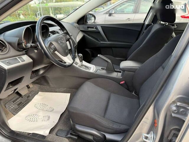 Мазда 3, объемом двигателя 1.6 л и пробегом 128 тыс. км за 8400 $, фото 6 на Automoto.ua