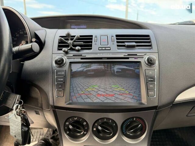 Мазда 3, объемом двигателя 1.6 л и пробегом 128 тыс. км за 8400 $, фото 14 на Automoto.ua