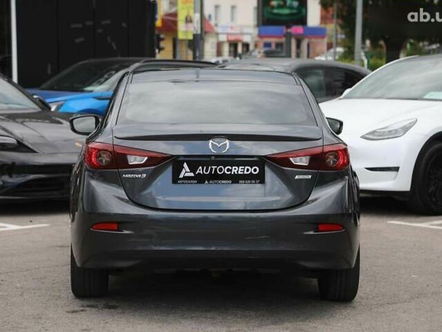 Мазда 3, объемом двигателя 2 л и пробегом 185 тыс. км за 9800 $, фото 4 на Automoto.ua