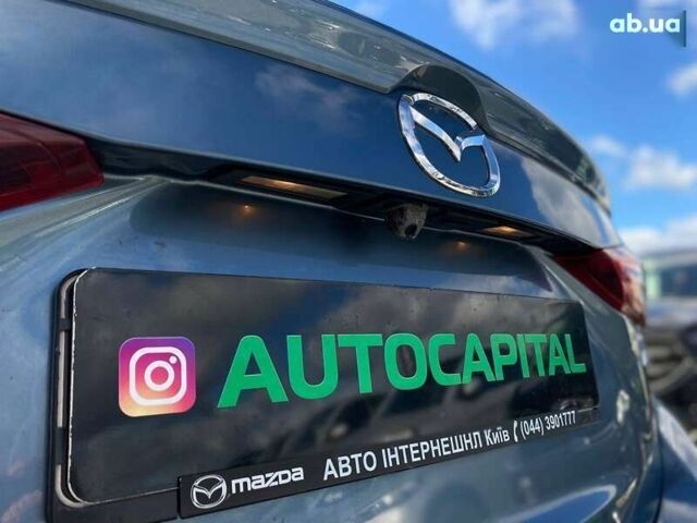 Мазда 3, объемом двигателя 1.5 л и пробегом 222 тыс. км за 10990 $, фото 12 на Automoto.ua