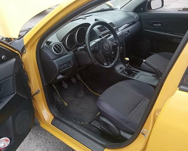 Желтый Мазда 3, объемом двигателя 2 л и пробегом 330 тыс. км за 2800 $, фото 11 на Automoto.ua