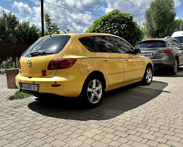 Жовтий Мазда 3, об'ємом двигуна 1.6 л та пробігом 159 тис. км за 4900 $, фото 4 на Automoto.ua