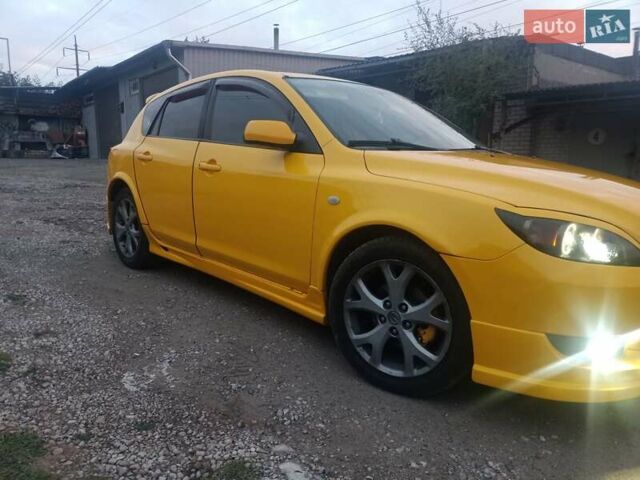 Желтый Мазда 3, объемом двигателя 1.6 л и пробегом 205 тыс. км за 5550 $, фото 9 на Automoto.ua