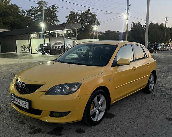 Желтый Мазда 3, объемом двигателя 1.6 л и пробегом 200 тыс. км за 2900 $, фото 1 на Automoto.ua