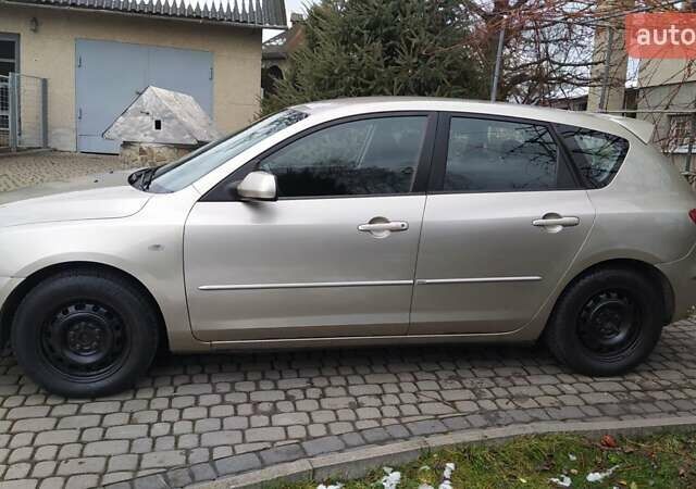 Жовтий Мазда 3, об'ємом двигуна 1.56 л та пробігом 191 тис. км за 2950 $, фото 3 на Automoto.ua