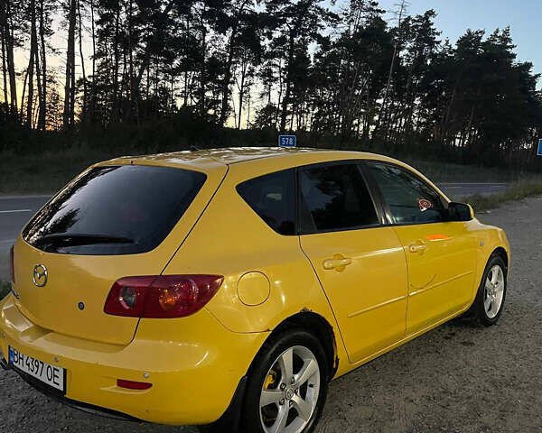Желтый Мазда 3, объемом двигателя 1.6 л и пробегом 200 тыс. км за 3500 $, фото 5 на Automoto.ua