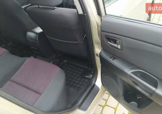 Жовтий Мазда 3, об'ємом двигуна 1.56 л та пробігом 191 тис. км за 2950 $, фото 17 на Automoto.ua