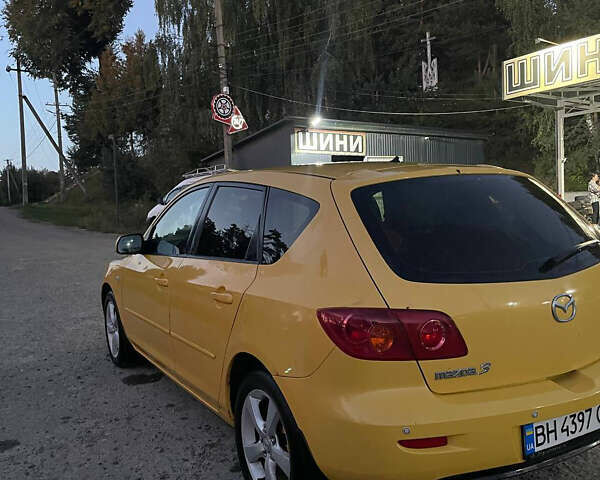 Желтый Мазда 3, объемом двигателя 1.6 л и пробегом 200 тыс. км за 3500 $, фото 4 на Automoto.ua