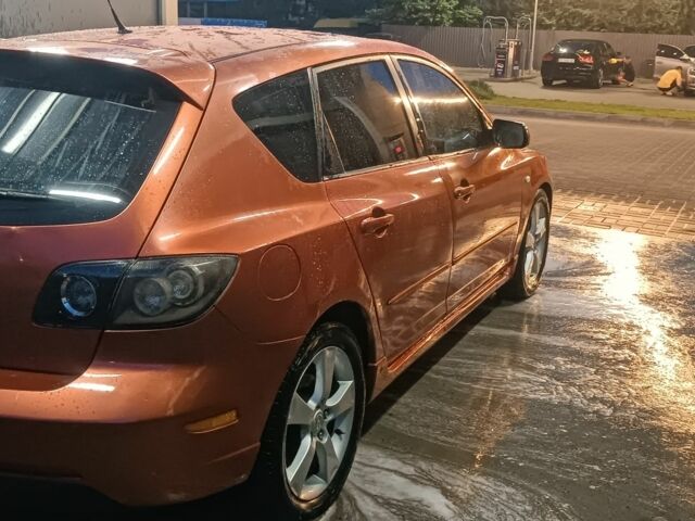 Желтый Мазда 3, объемом двигателя 2 л и пробегом 230 тыс. км за 3800 $, фото 3 на Automoto.ua