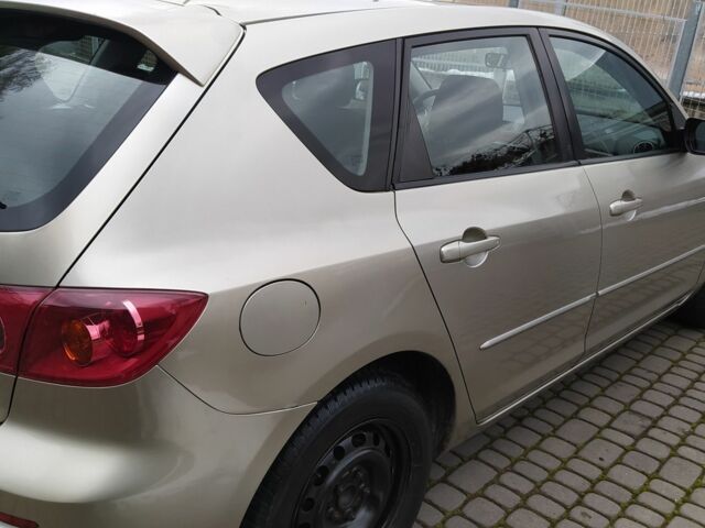 Желтый Мазда 3, объемом двигателя 1.6 л и пробегом 191 тыс. км за 2950 $, фото 6 на Automoto.ua