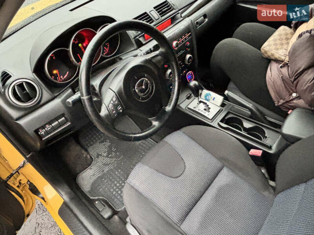 Желтый Мазда 3, объемом двигателя 1.6 л и пробегом 200 тыс. км за 3400 $, фото 11 на Automoto.ua