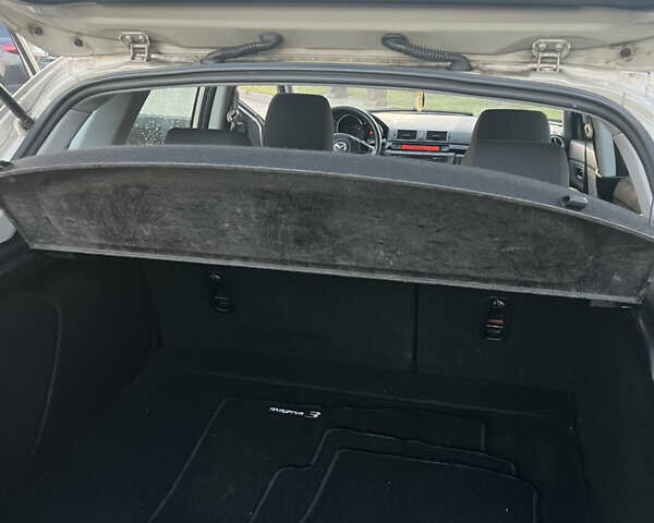 Жовтий Мазда 3, об'ємом двигуна 1.56 л та пробігом 190 тис. км за 3399 $, фото 15 на Automoto.ua