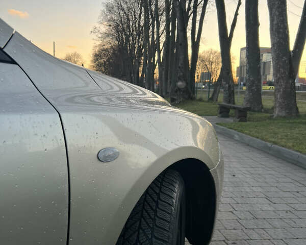 Жовтий Мазда 3, об'ємом двигуна 1.56 л та пробігом 190 тис. км за 3399 $, фото 7 на Automoto.ua