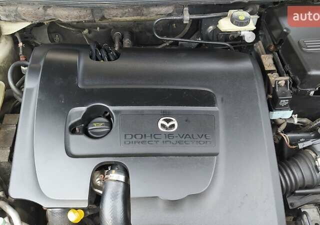 Жовтий Мазда 3, об'ємом двигуна 1.56 л та пробігом 191 тис. км за 2950 $, фото 20 на Automoto.ua