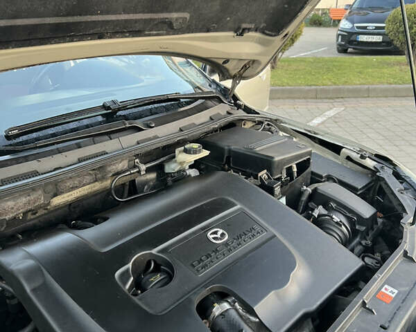 Жовтий Мазда 3, об'ємом двигуна 1.56 л та пробігом 190 тис. км за 3399 $, фото 16 на Automoto.ua