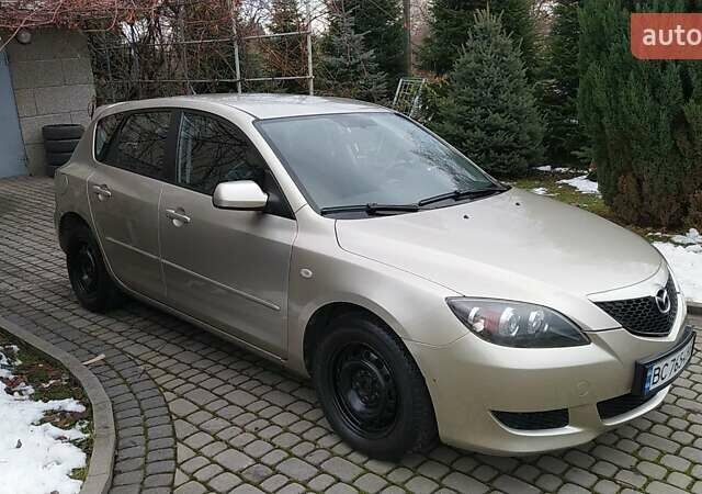 Жовтий Мазда 3, об'ємом двигуна 1.56 л та пробігом 191 тис. км за 2950 $, фото 4 на Automoto.ua