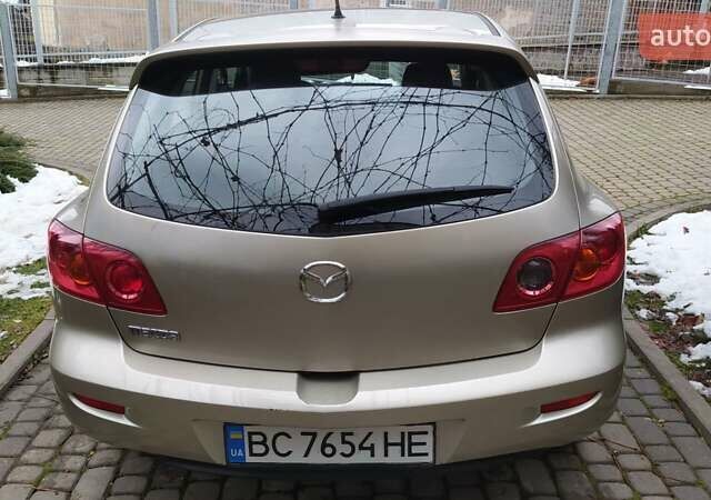 Жовтий Мазда 3, об'ємом двигуна 1.56 л та пробігом 191 тис. км за 2950 $, фото 6 на Automoto.ua