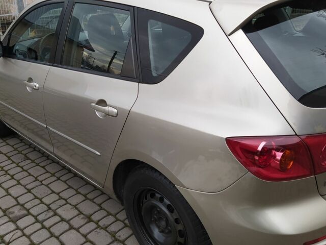 Желтый Мазда 3, объемом двигателя 1.6 л и пробегом 191 тыс. км за 2950 $, фото 7 на Automoto.ua