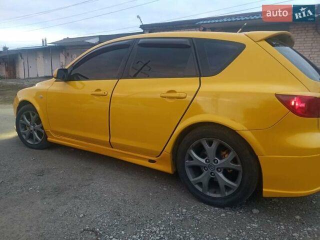 Желтый Мазда 3, объемом двигателя 1.6 л и пробегом 205 тыс. км за 5550 $, фото 3 на Automoto.ua