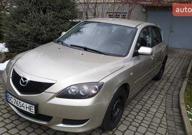 Жовтий Мазда 3, об'ємом двигуна 1.56 л та пробігом 191 тис. км за 2950 $, фото 2 на Automoto.ua