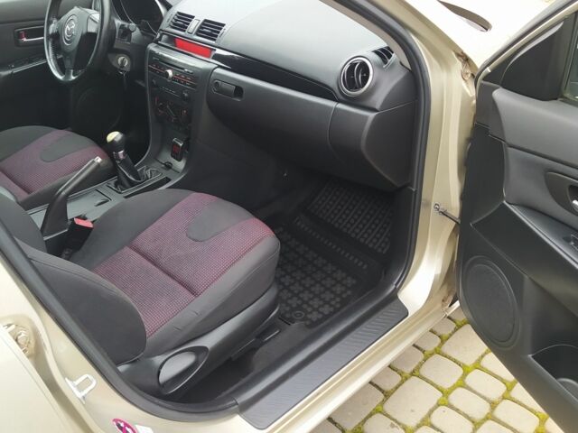 Желтый Мазда 3, объемом двигателя 1.6 л и пробегом 191 тыс. км за 2950 $, фото 17 на Automoto.ua