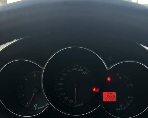 Жовтий Мазда 3, об'ємом двигуна 1.56 л та пробігом 190 тис. км за 3399 $, фото 10 на Automoto.ua