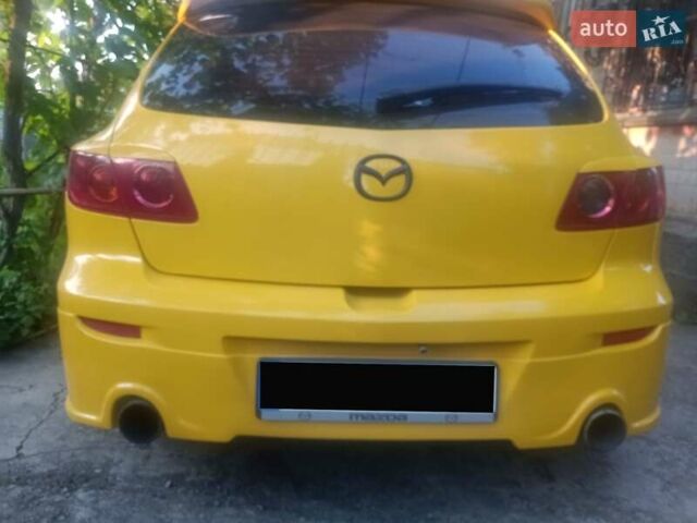 Желтый Мазда 3, объемом двигателя 1.6 л и пробегом 205 тыс. км за 5550 $, фото 14 на Automoto.ua