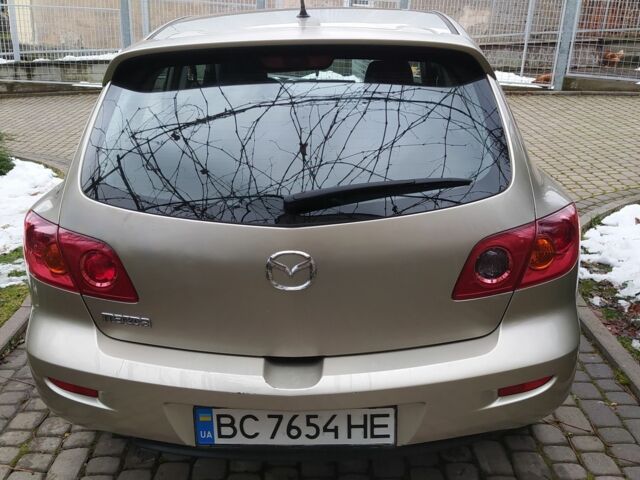 Желтый Мазда 3, объемом двигателя 1.6 л и пробегом 191 тыс. км за 2950 $, фото 8 на Automoto.ua