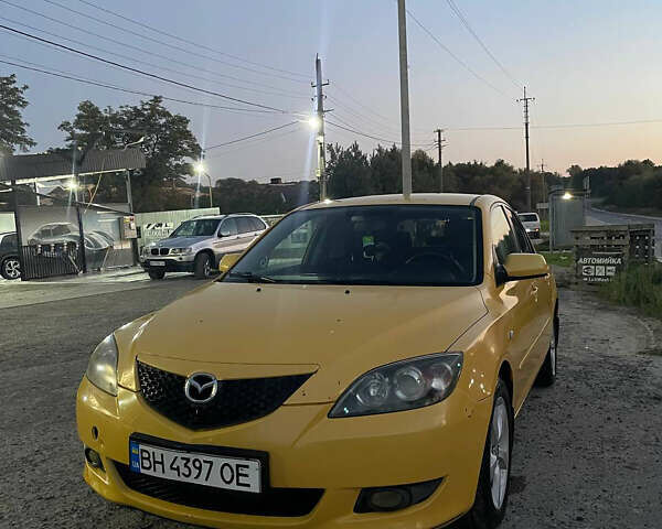 Желтый Мазда 3, объемом двигателя 1.6 л и пробегом 200 тыс. км за 3500 $, фото 3 на Automoto.ua