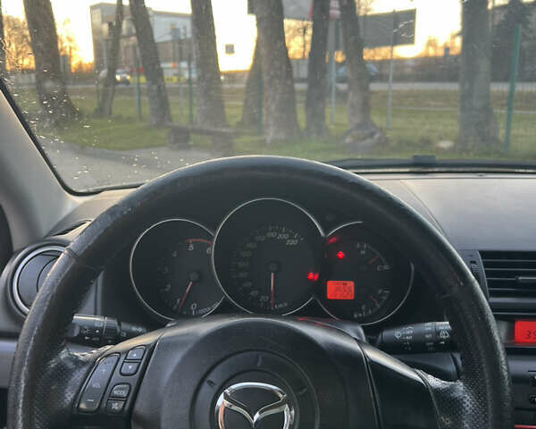 Жовтий Мазда 3, об'ємом двигуна 1.56 л та пробігом 190 тис. км за 3399 $, фото 11 на Automoto.ua