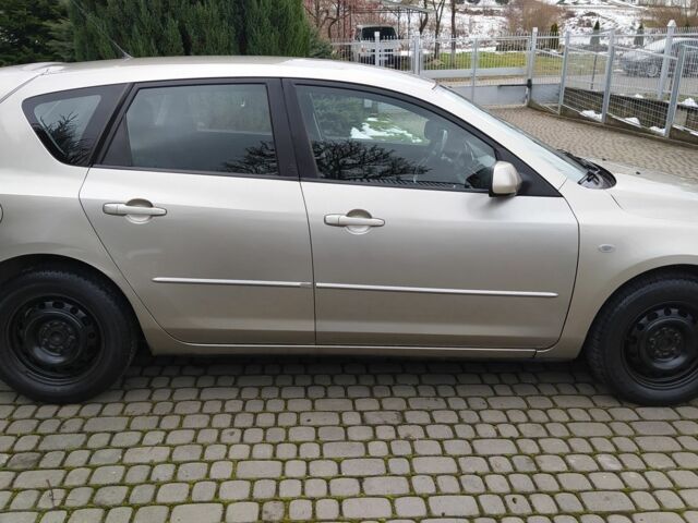 Желтый Мазда 3, объемом двигателя 1.6 л и пробегом 191 тыс. км за 2950 $, фото 5 на Automoto.ua