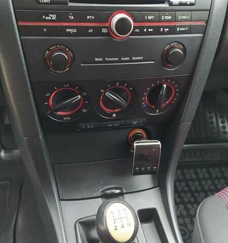 Жовтий Мазда 3, об'ємом двигуна 1.56 л та пробігом 191 тис. км за 2950 $, фото 11 на Automoto.ua