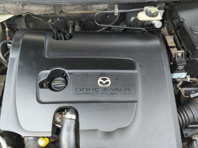 Желтый Мазда 3, объемом двигателя 1.6 л и пробегом 191 тыс. км за 2950 $, фото 23 на Automoto.ua