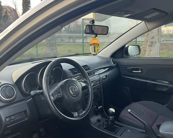 Жовтий Мазда 3, об'ємом двигуна 1.56 л та пробігом 190 тис. км за 3399 $, фото 8 на Automoto.ua